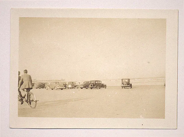 1930's NINE CARS & A TANDEM BICYCLE ON DAYTONA BEACH SNAPSHOT